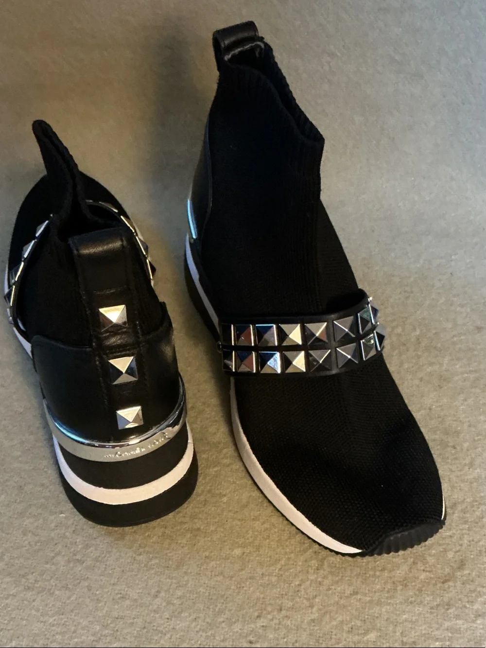 Michael Kors Black Knit Slip-On Sneakers with Silver Pyramid Stud Strap